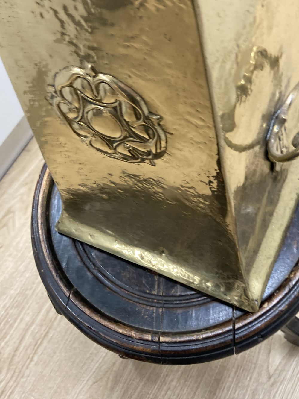 A carved tripod vase stand, an Arts & Crafts hammered brass vase, height 56cm, two umbrellas and two walking sticks